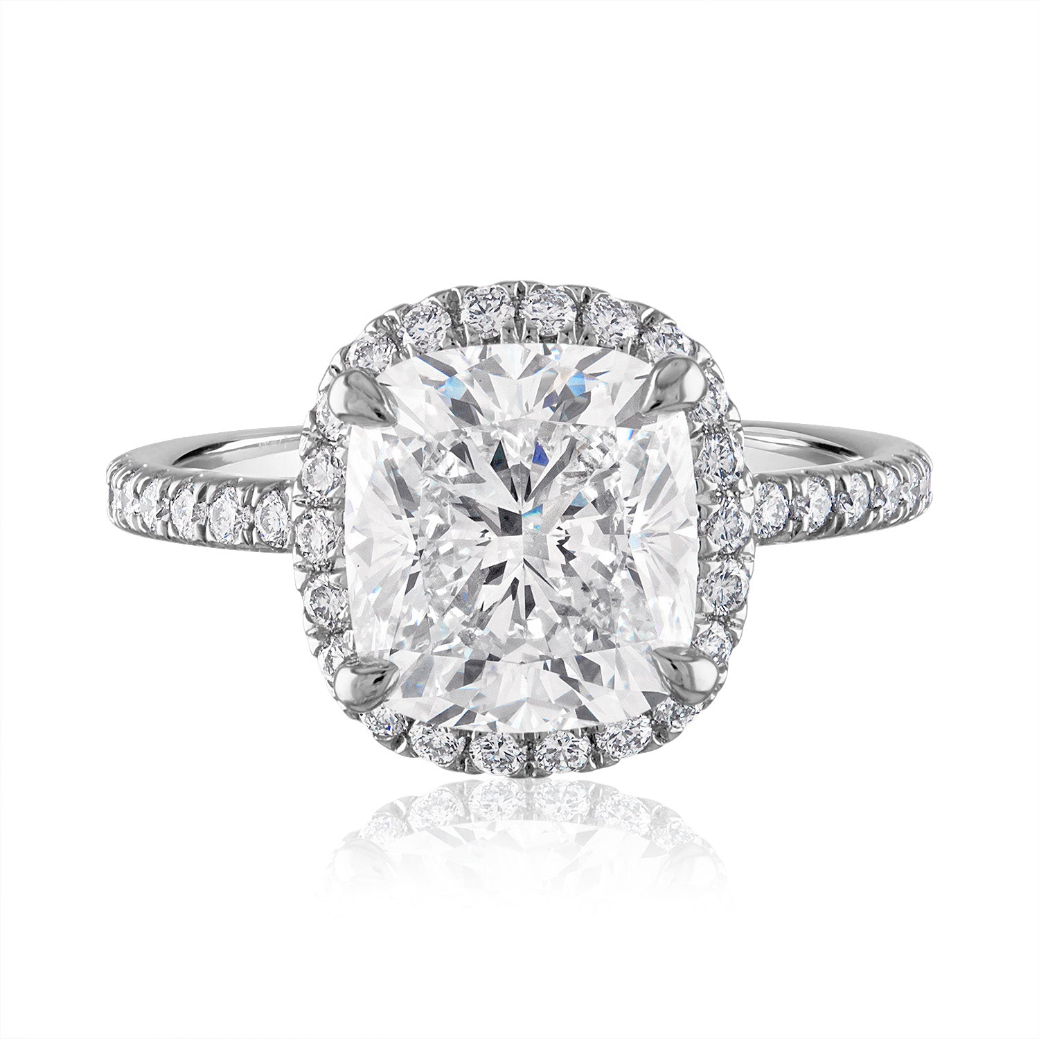 Elongated Cushion Cut Engagement Ring set in Halo Pave Platinum setting